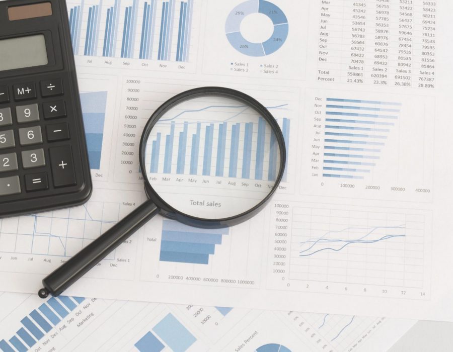business-graphs-charts-magnifying-glass-and-calculator-on-table-financial-development-e1637859142569-pglch9arkpihm617r0tozbt9l7m50d6mx5lswdzlg8